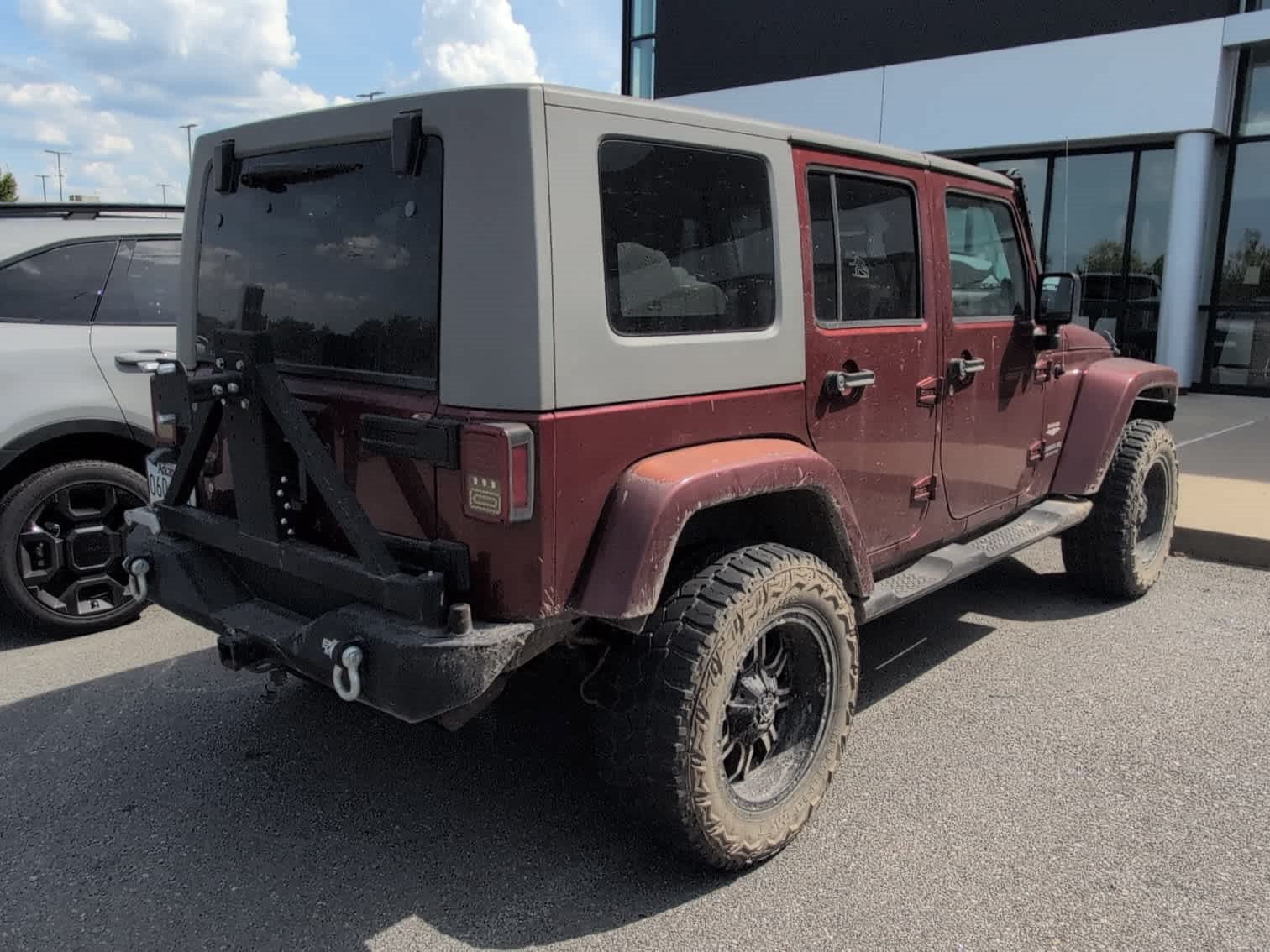 Used 2007 Red Rock Crystal Pearl Jeep Unlimited Sahara image 4