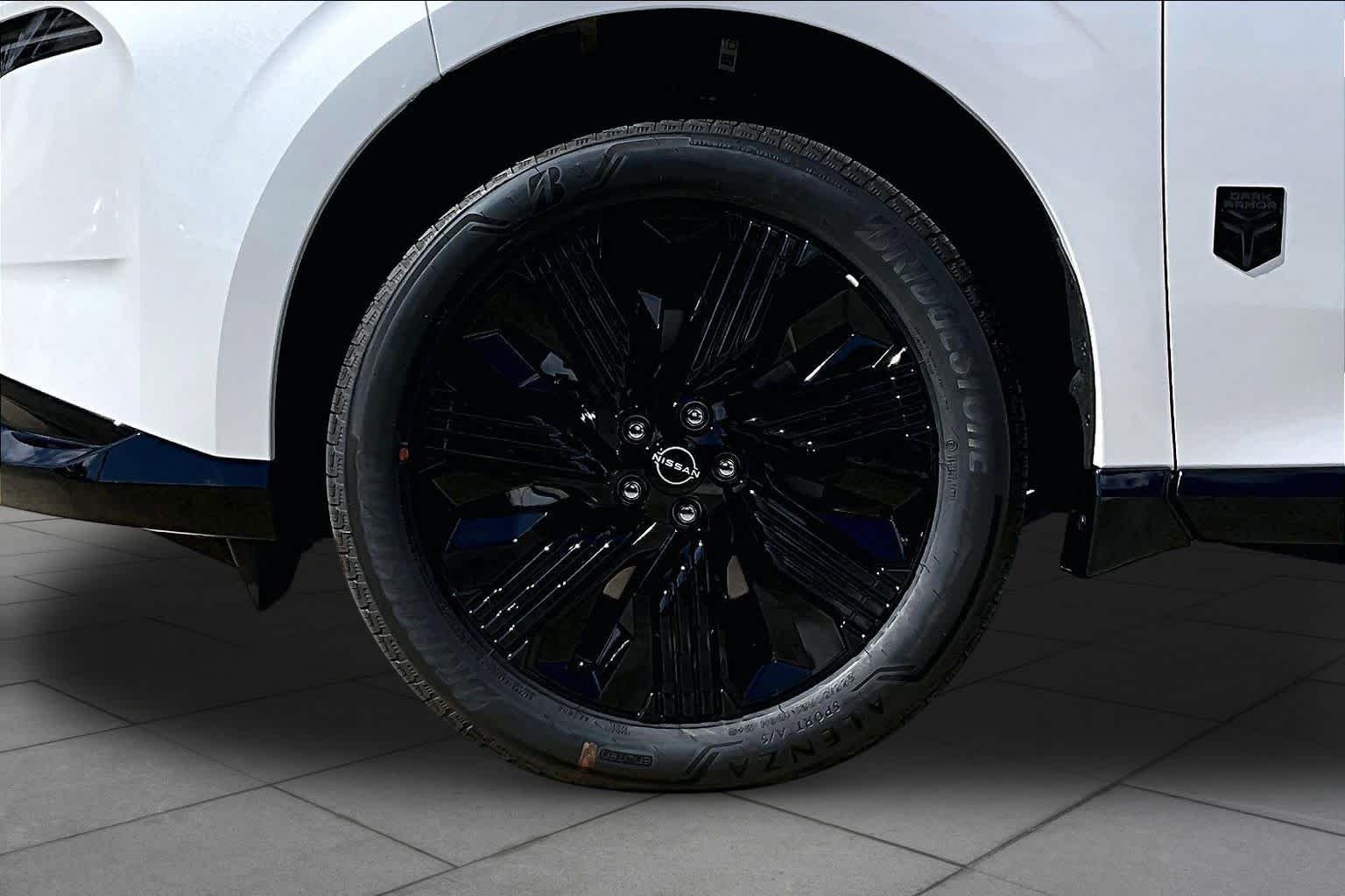 New 2027 Everest White Pearl TriCoat Nissan Dark Armor image 9