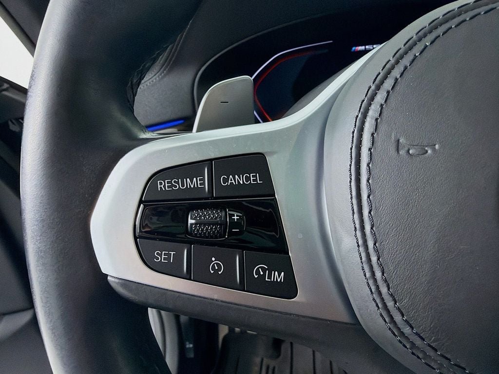 Used 2021 Carbon Black Metallic BMW M550i xDrive image 11