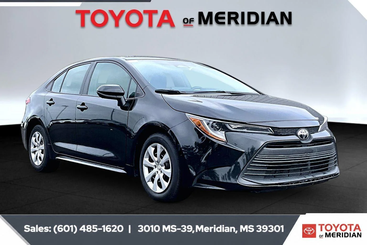 Used 2024 Midnight Black Metallic Toyota LE image 1