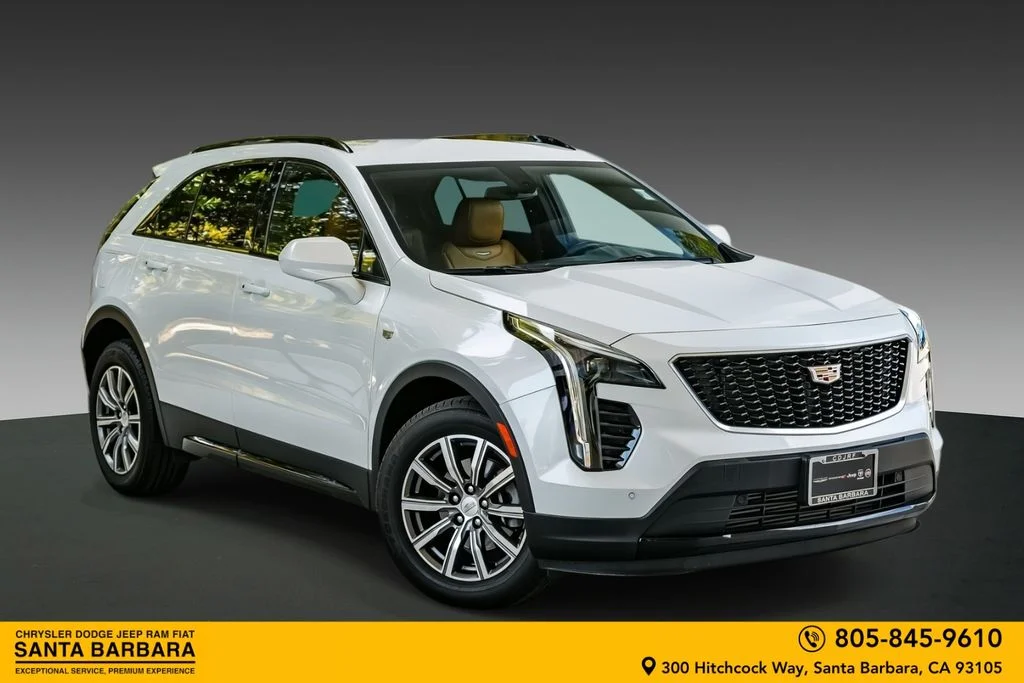 Used 2019 White Cadillac Sport image 1