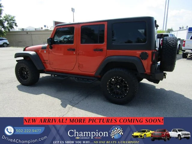 Used 2015 Orange Jeep Unlimited Sport image 7