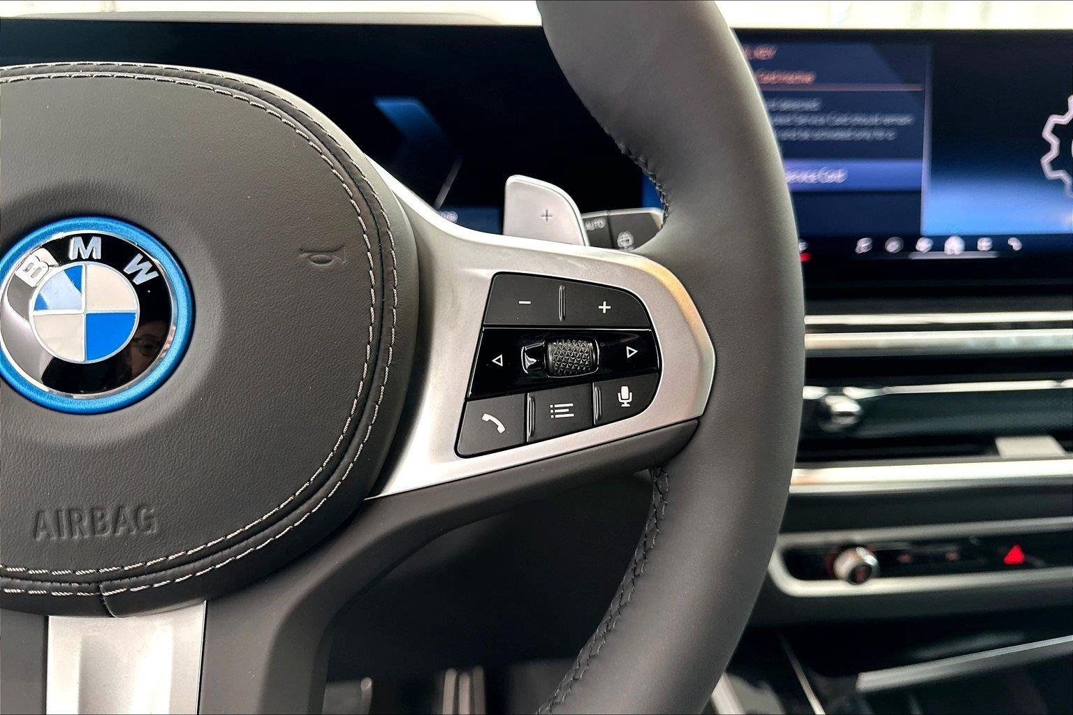 New 2026 Black Sapphire Metallic BMW xDrive50e image 17