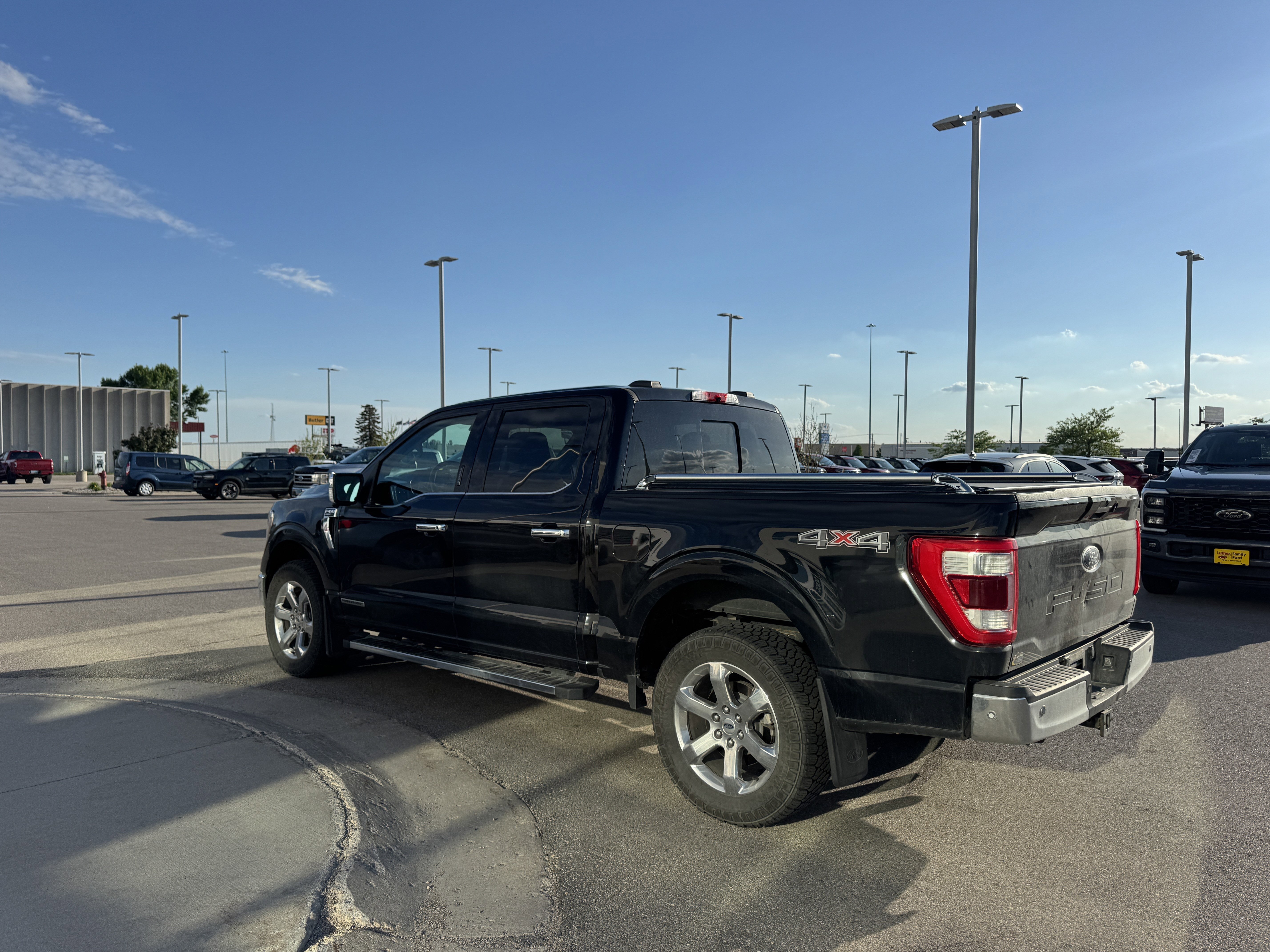 Used 2021 Agate Black Metallic Ford LARIAT image 4