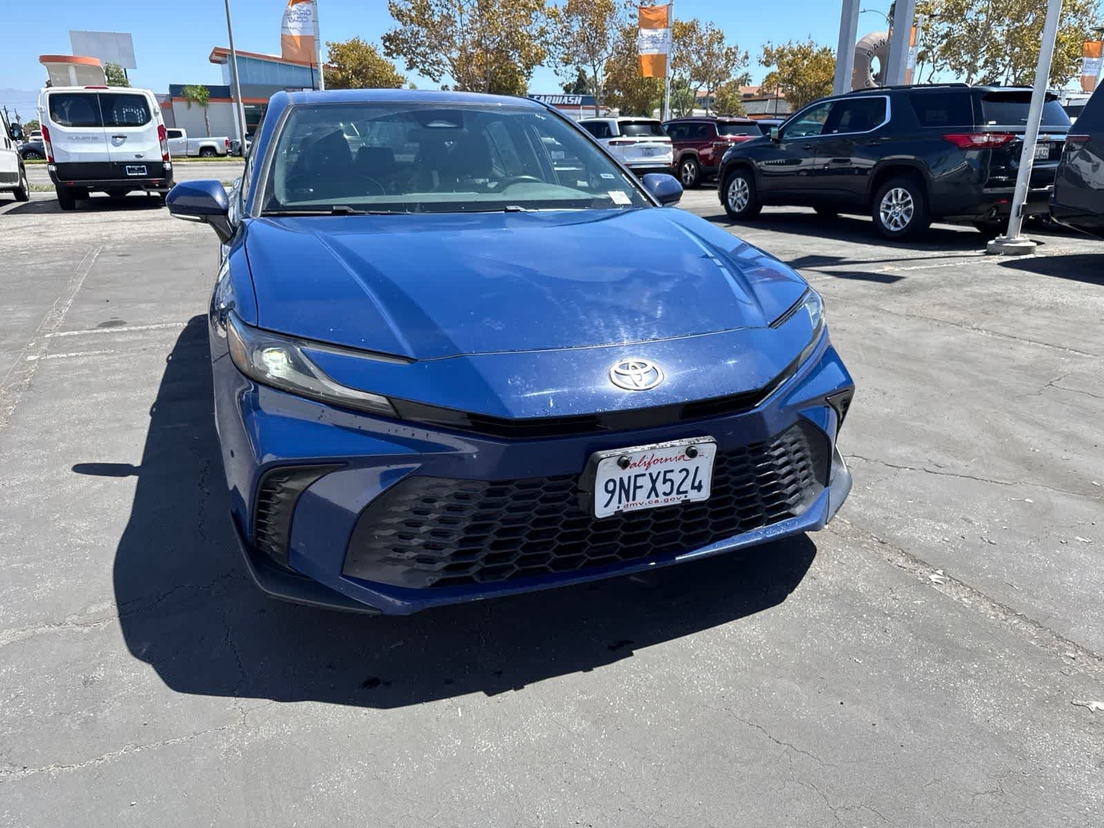 Used 2025 Reservoir Blue Toyota SE image 5