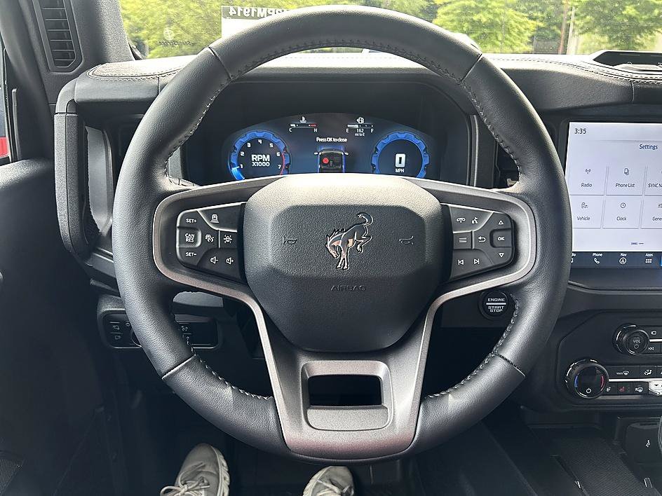 Used 2025 Blue Metallic Ford Badlands image 14