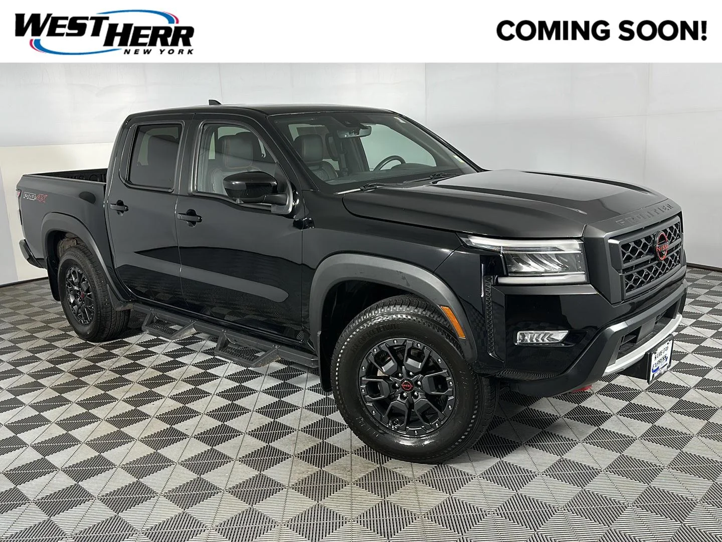 Used 2023 Super Black Nissan PRO-4X image 1