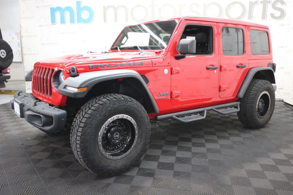 Used 2019 Red Jeep Unlimited Sahara image 2