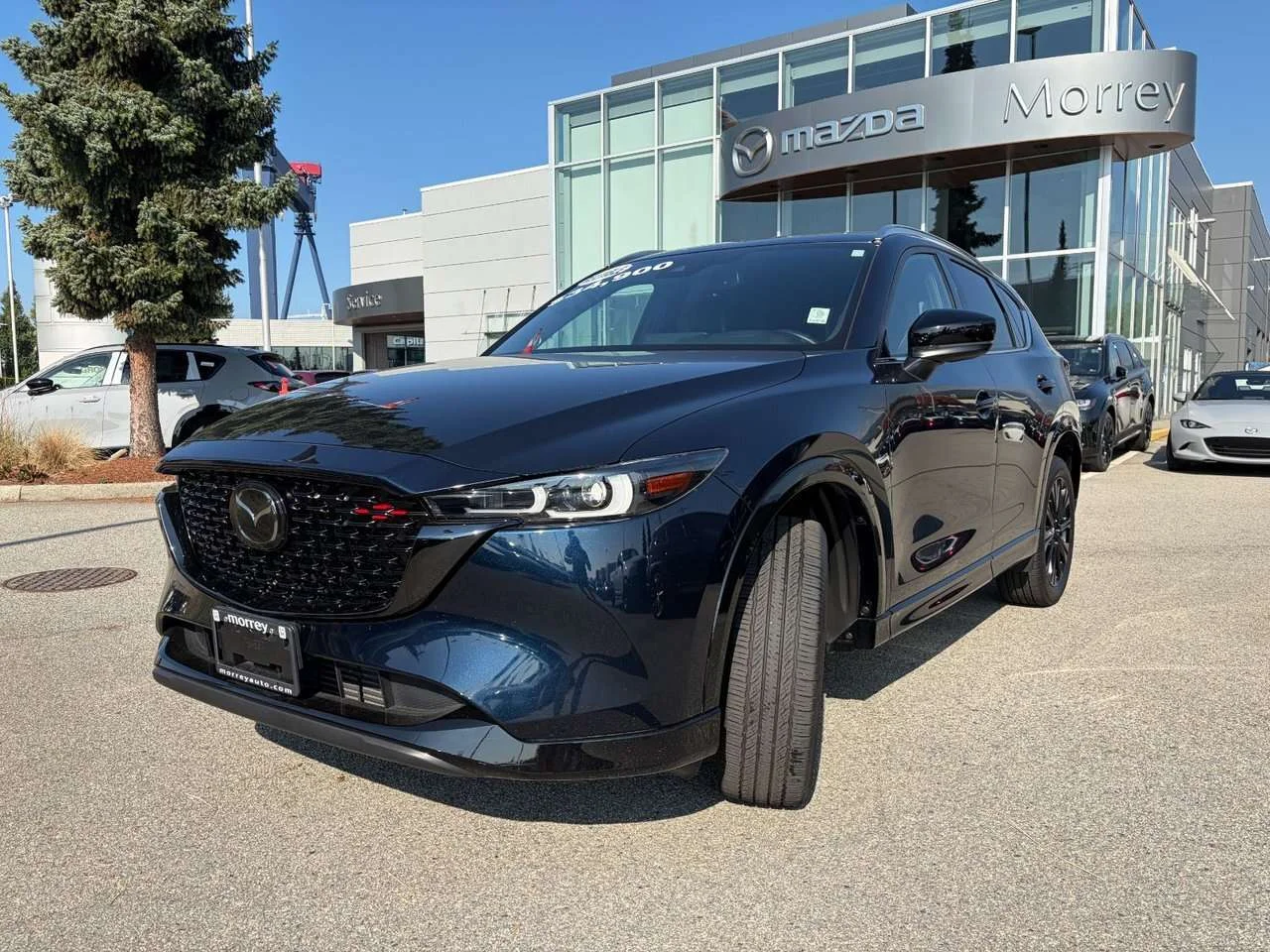 Used 2023 Deep Crystal Blue Mica Mazda Sport Design image 1