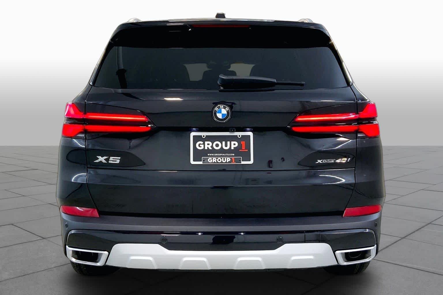 New 2026 Black Sapphire Metallic BMW xDrive40i image 4