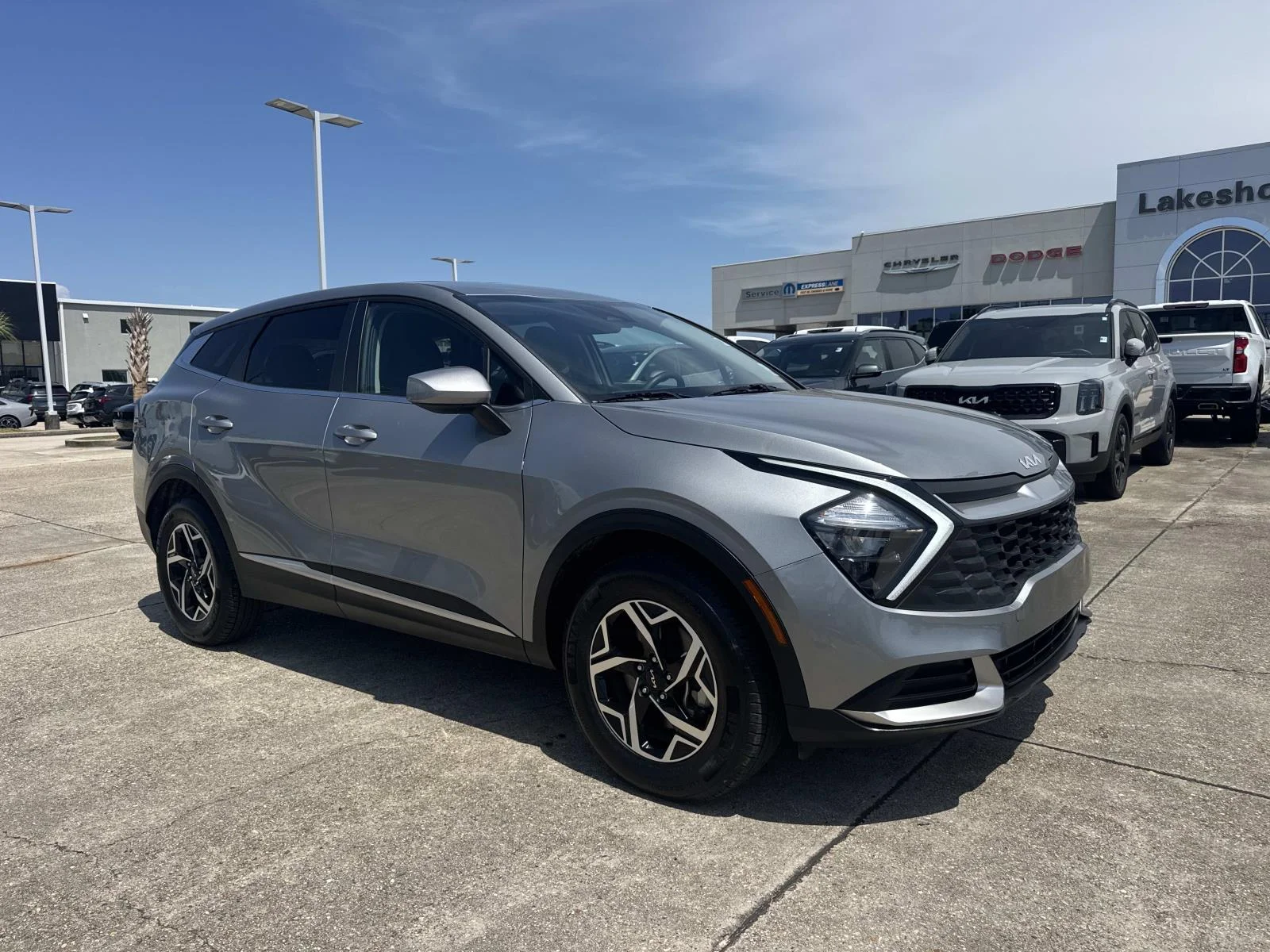Certified Used 2023 Gray Kia LX AWD image 1