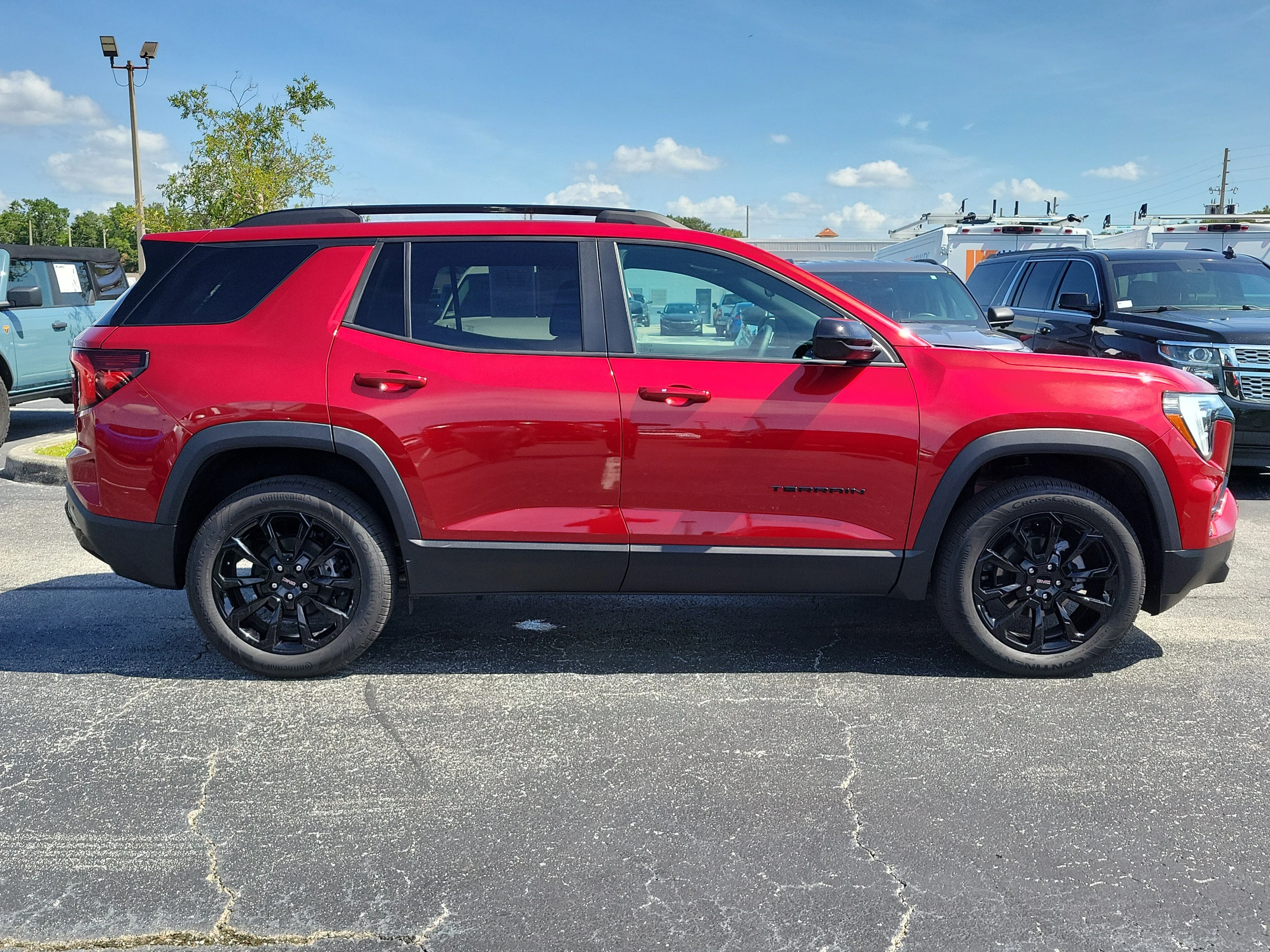 Used 2026 Volcanic Red Tintcoat GMC FWD Elevation image 8