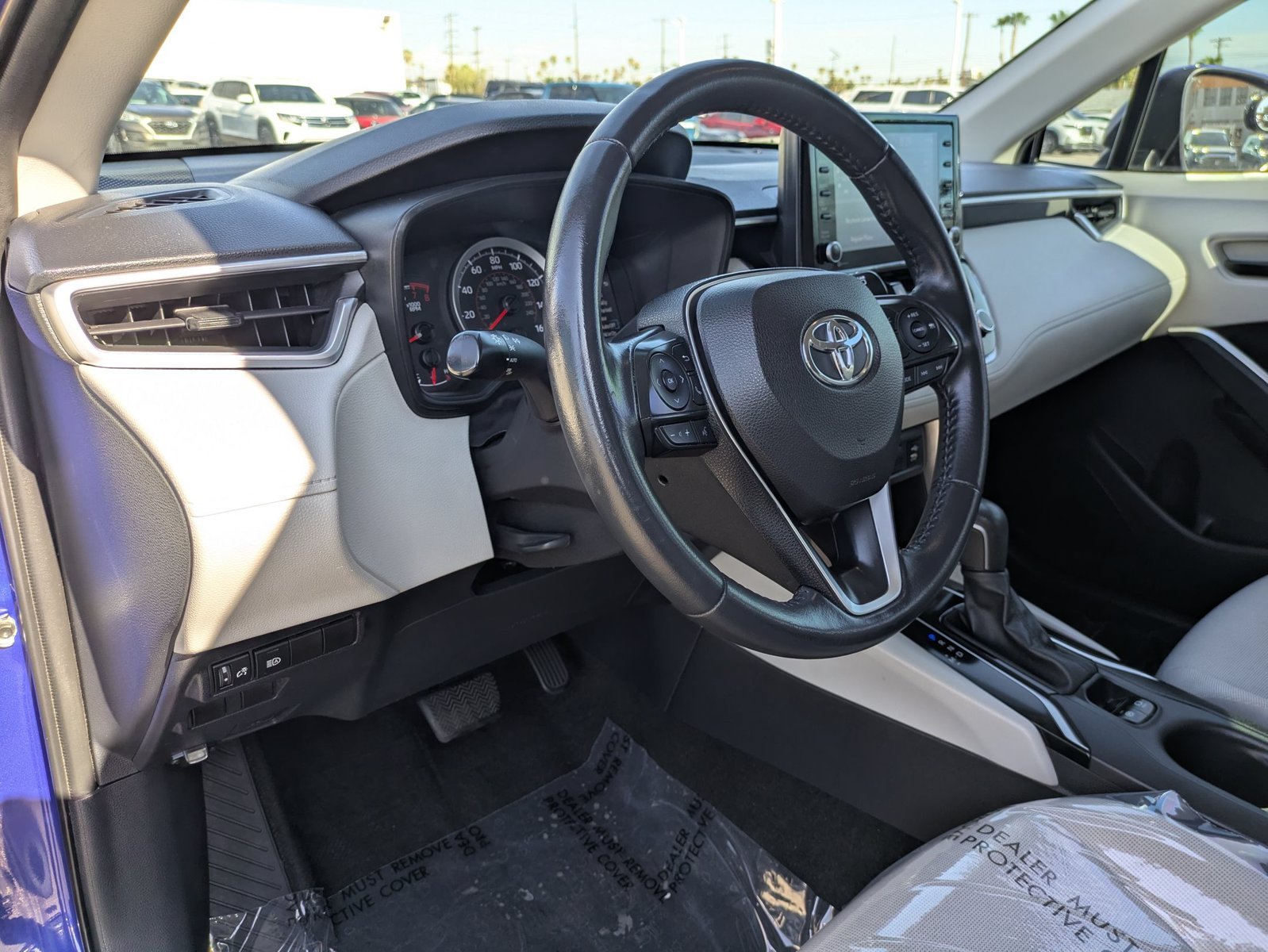 Used 2022 Blue Crush Metallic Toyota LE image 10