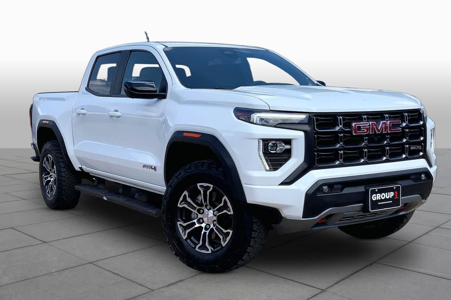 Used 2024 Summit White GMC 4WD AT4 image 3
