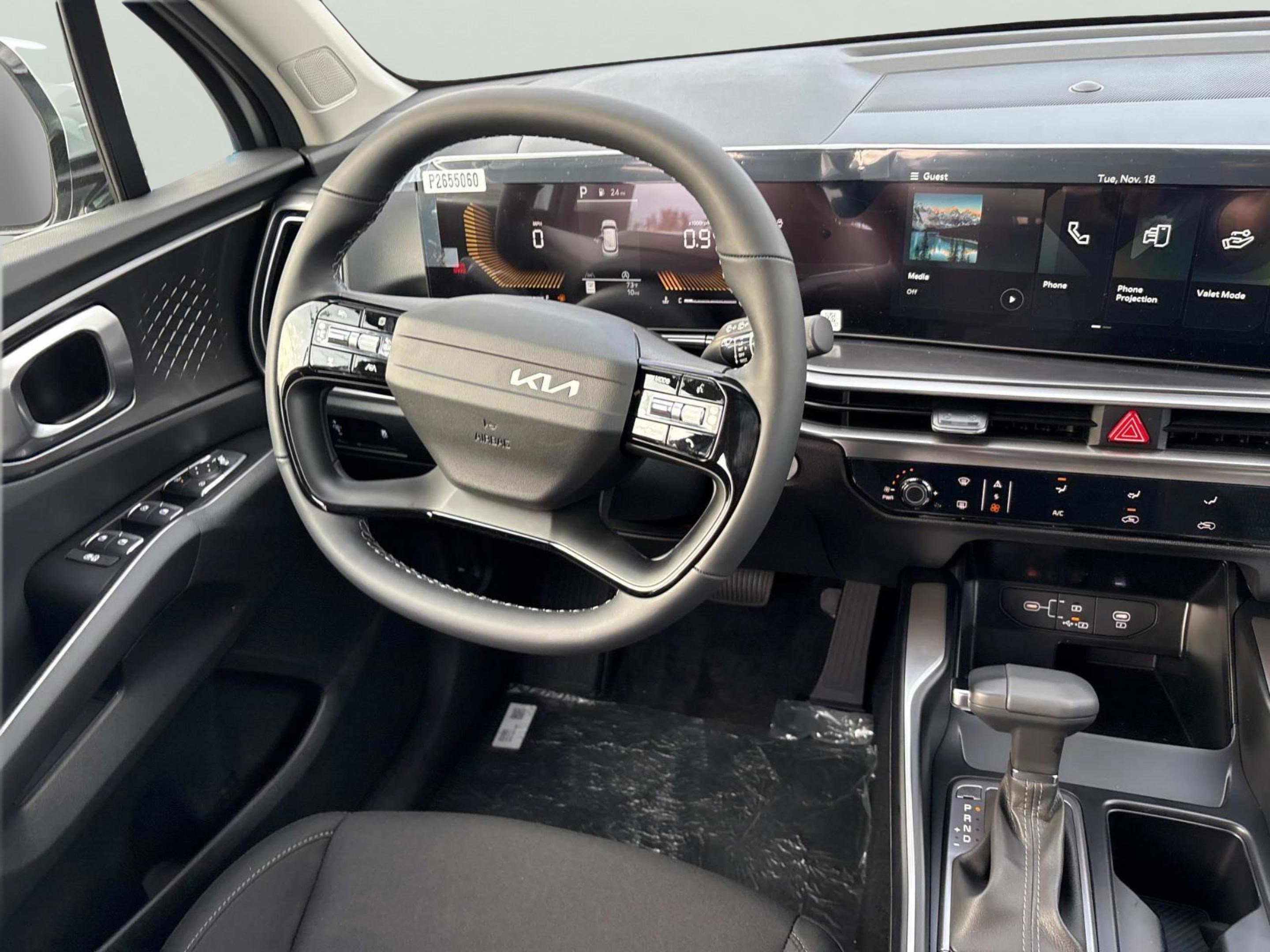 New 2026 Ivory Silver Kia LX image 13