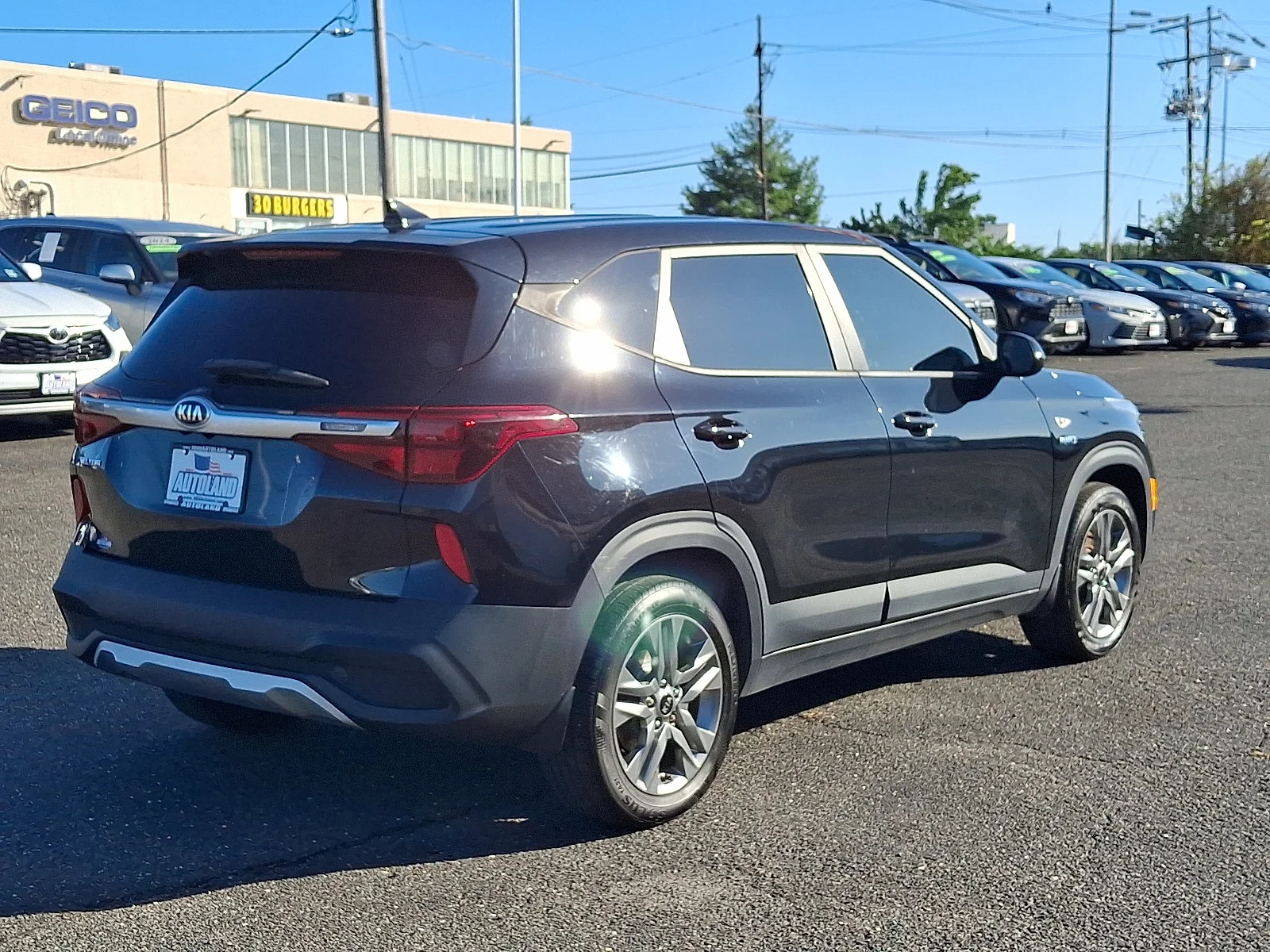 Used 2021 Cherry Black Kia LX image 7