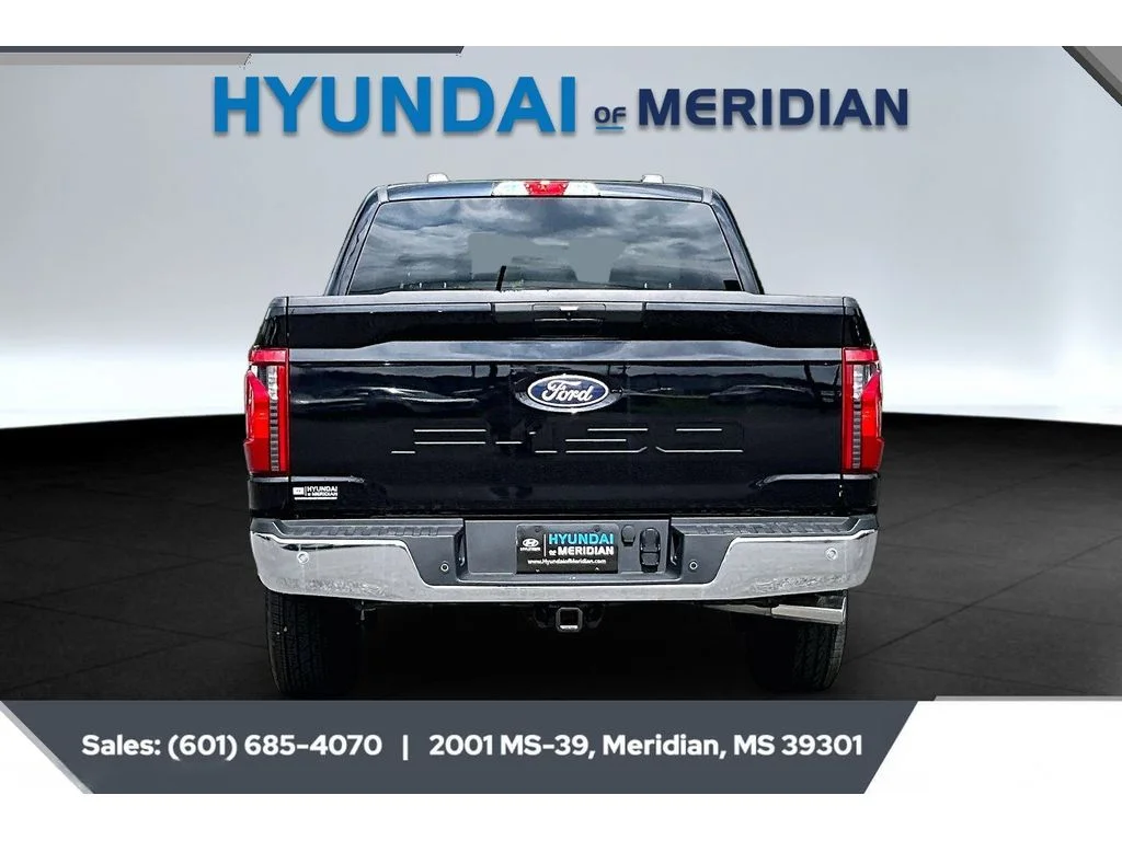 Used 2025 Agate Black Metallic Ford XLT image 4