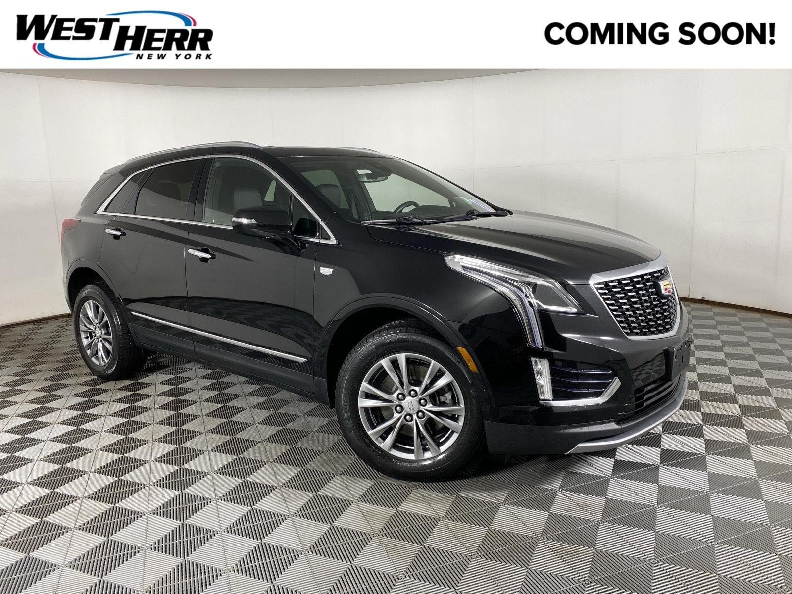 Used 2023 Stellar Black Metallic Cadillac AWD Premium Luxury image 1