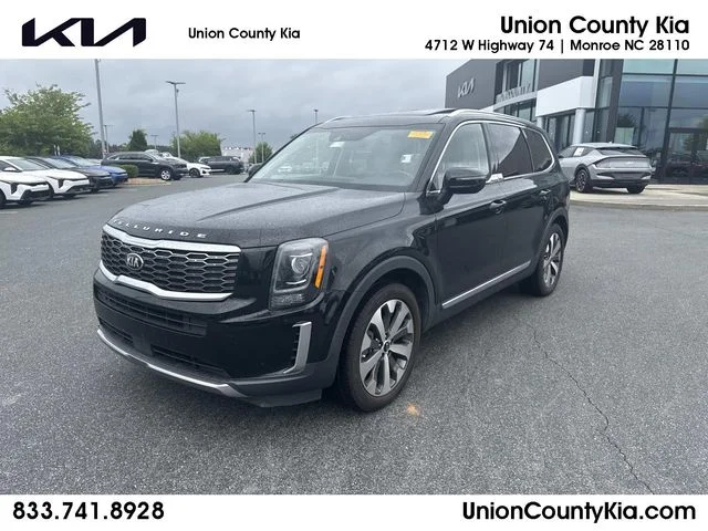 Used 2020 Black Kia EX image 1