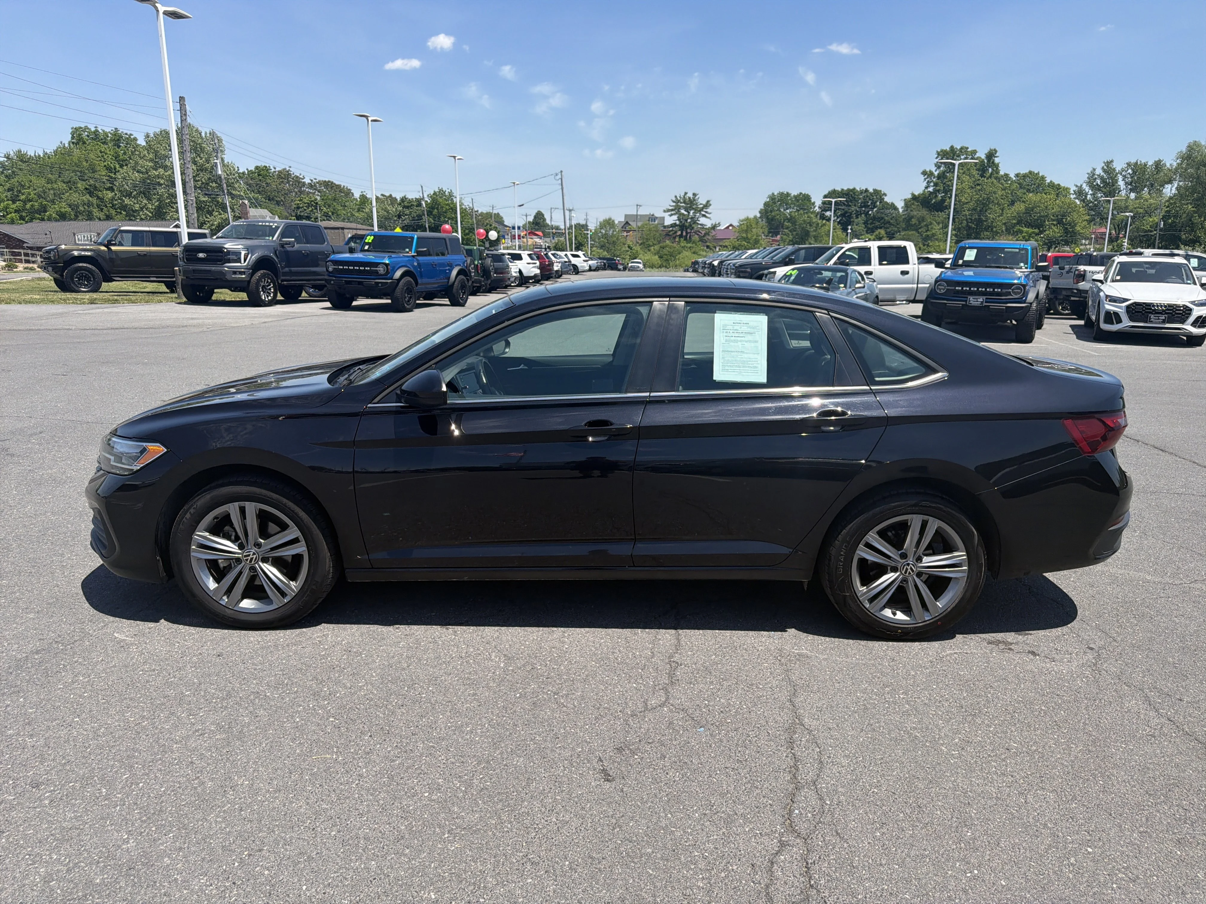 Used 2024 Black Volkswagen SE image 7