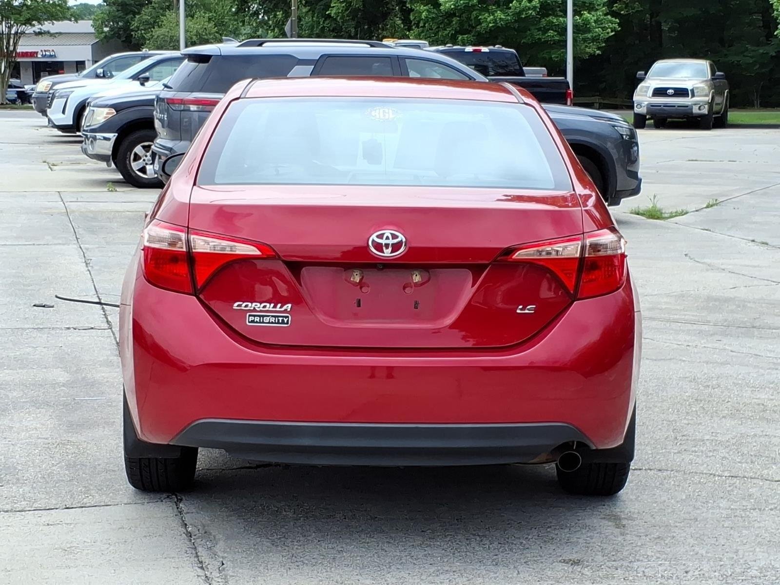 Used 2018 Barcelona Red Metallic Toyota LE image 10