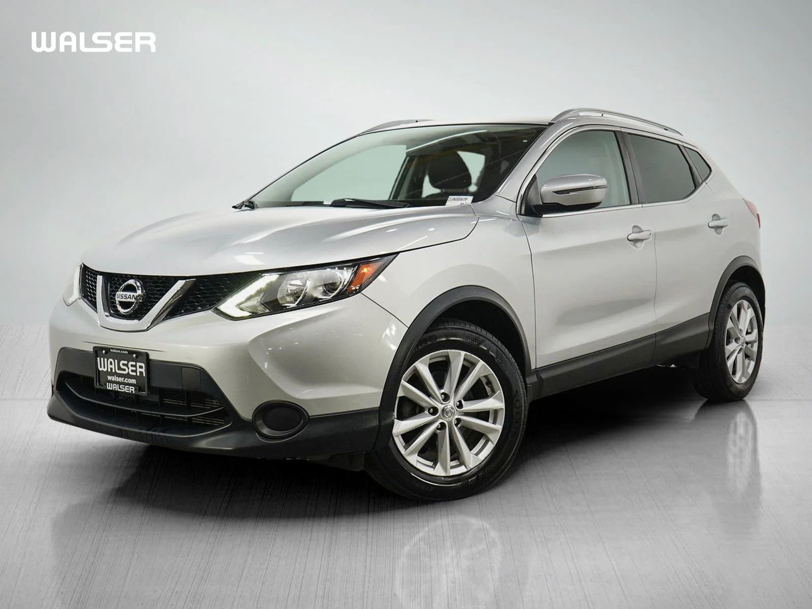 Used 2017 Brilliant Silver Nissan SV image 1