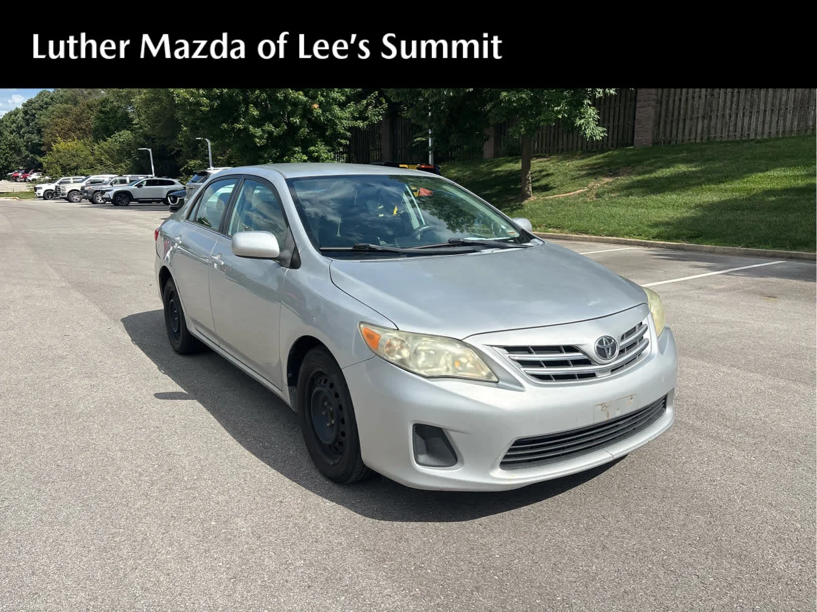 Used 2013 Classic Silver Metallic Toyota LE image 1