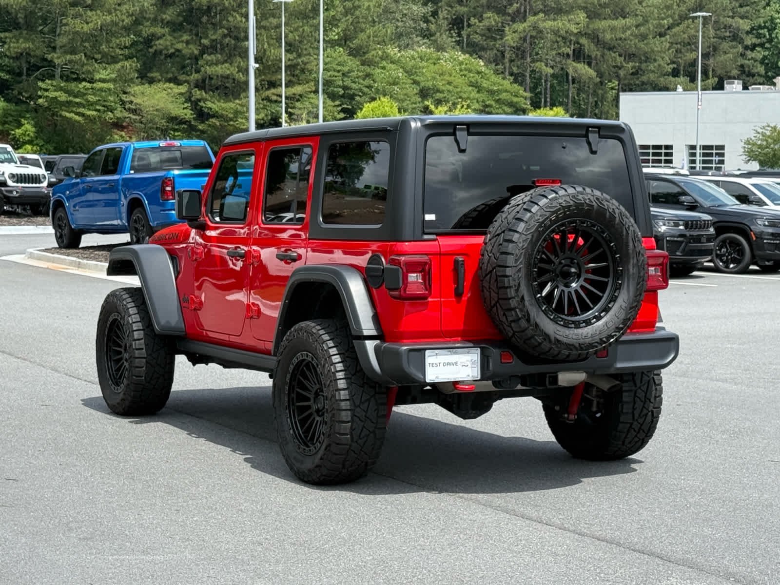 Used 2024 Firecracker Red Clearcoat Jeep Rubicon image 3