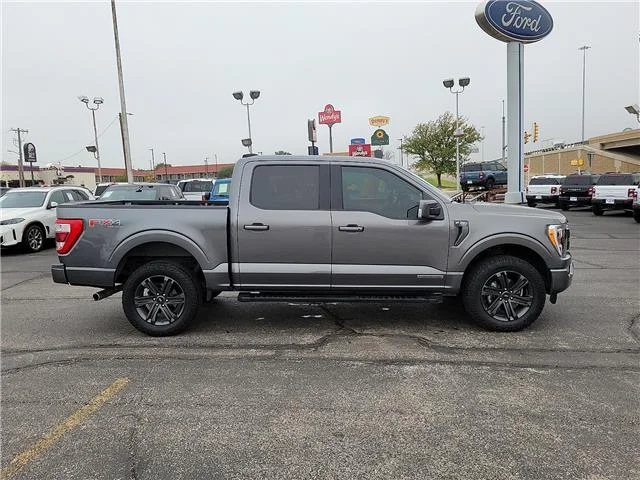 Used 2023 Carbonized Gray Metallic Ford Lariat 4x4 SuperCrew Cab 5.5 ft. box 145 in. WB image 4