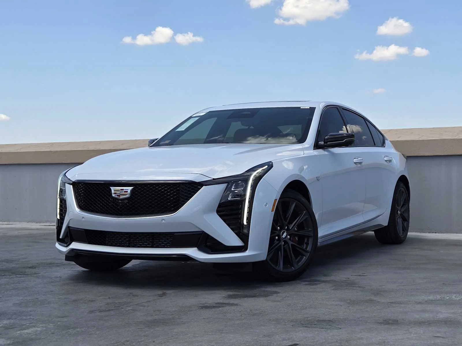 New 2026 Vibrant White Tricoat Cadillac Sport image 1