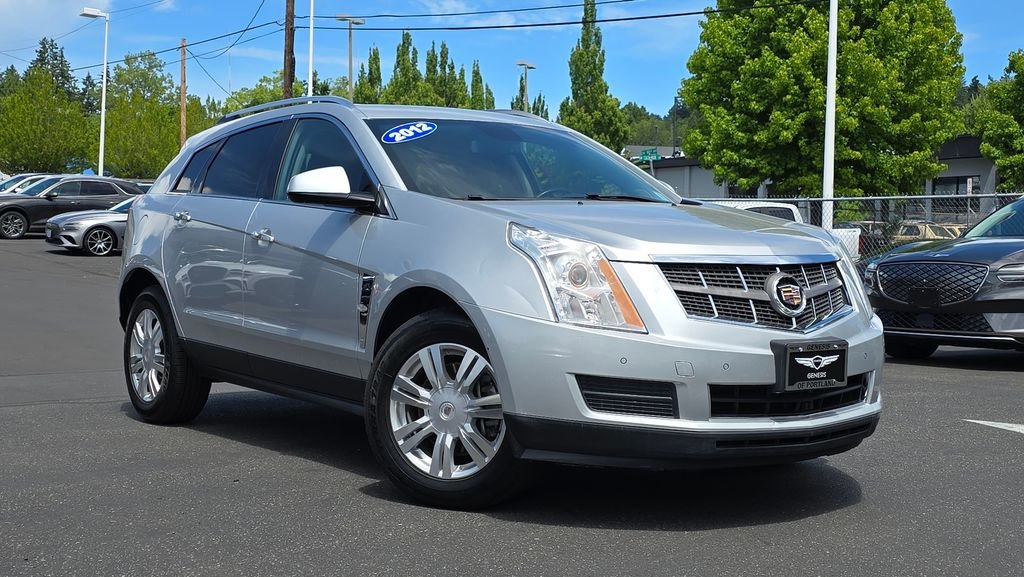 Used 2012 Radiant Silver Metallic Cadillac Luxury image 1