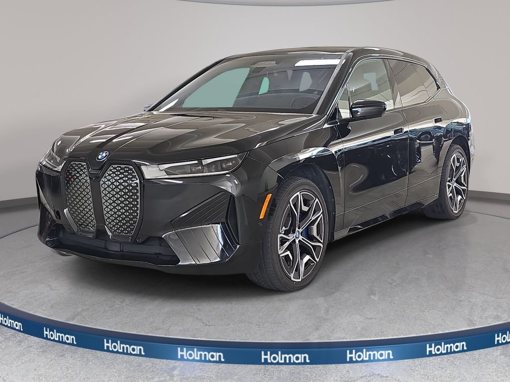 Used 2024 Black Sapphire Metallic BMW xDrive50 image 1