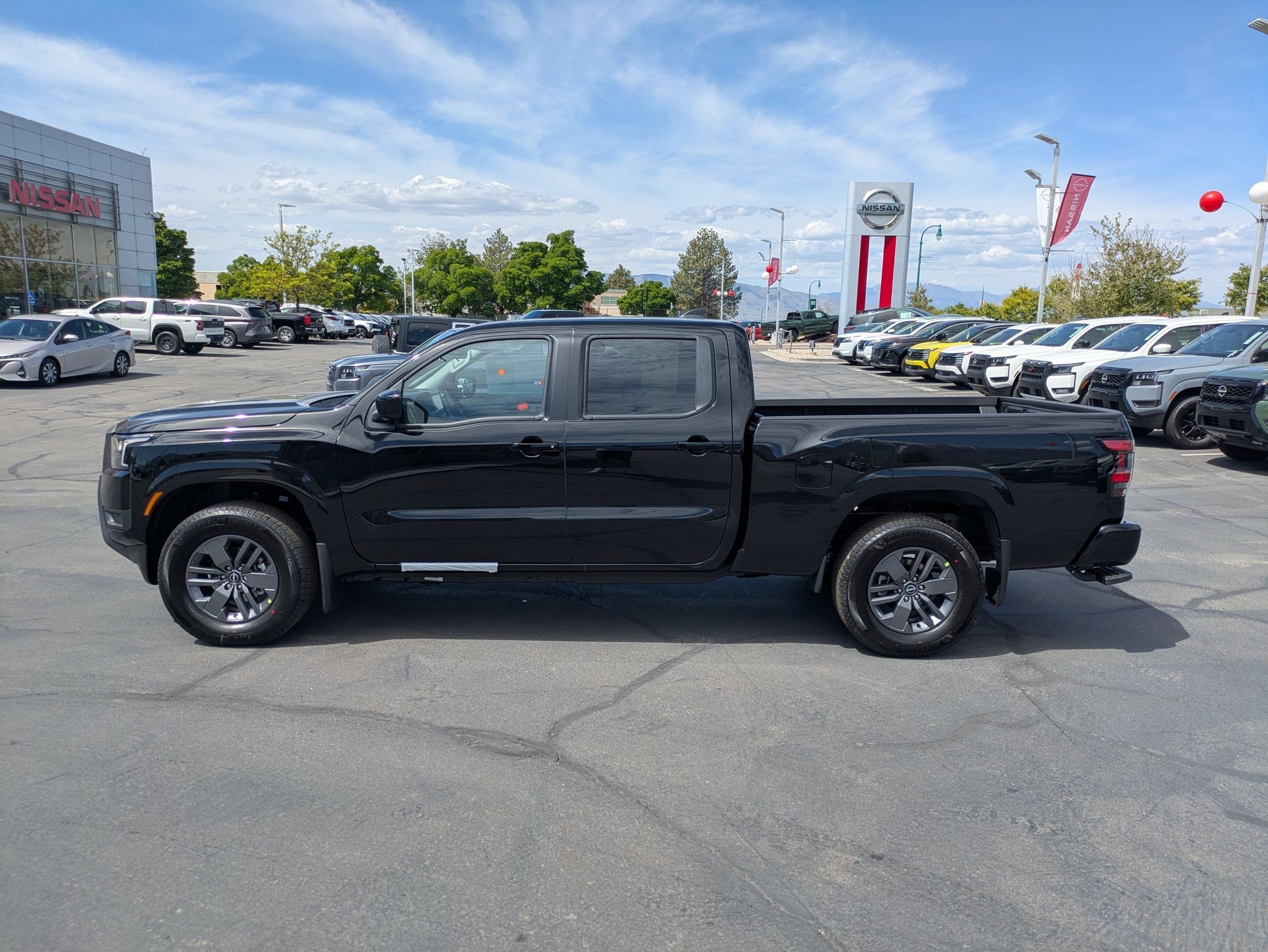 New 2026 Super Black Nissan Crew Cab SV Long Bed image 7