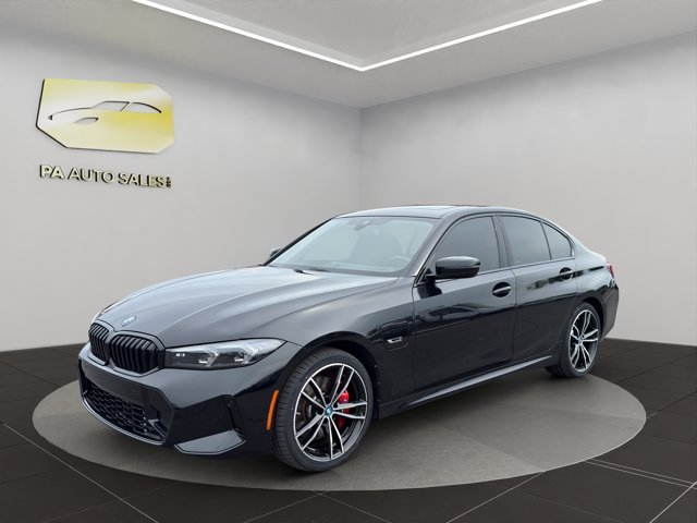 Used 2023 Black Sapphire Metallic BMW 330e xDrive image 3