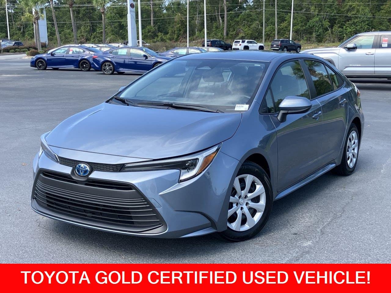 Used 2025 Blue (Celestite) Toyota Hybrid LE image 1