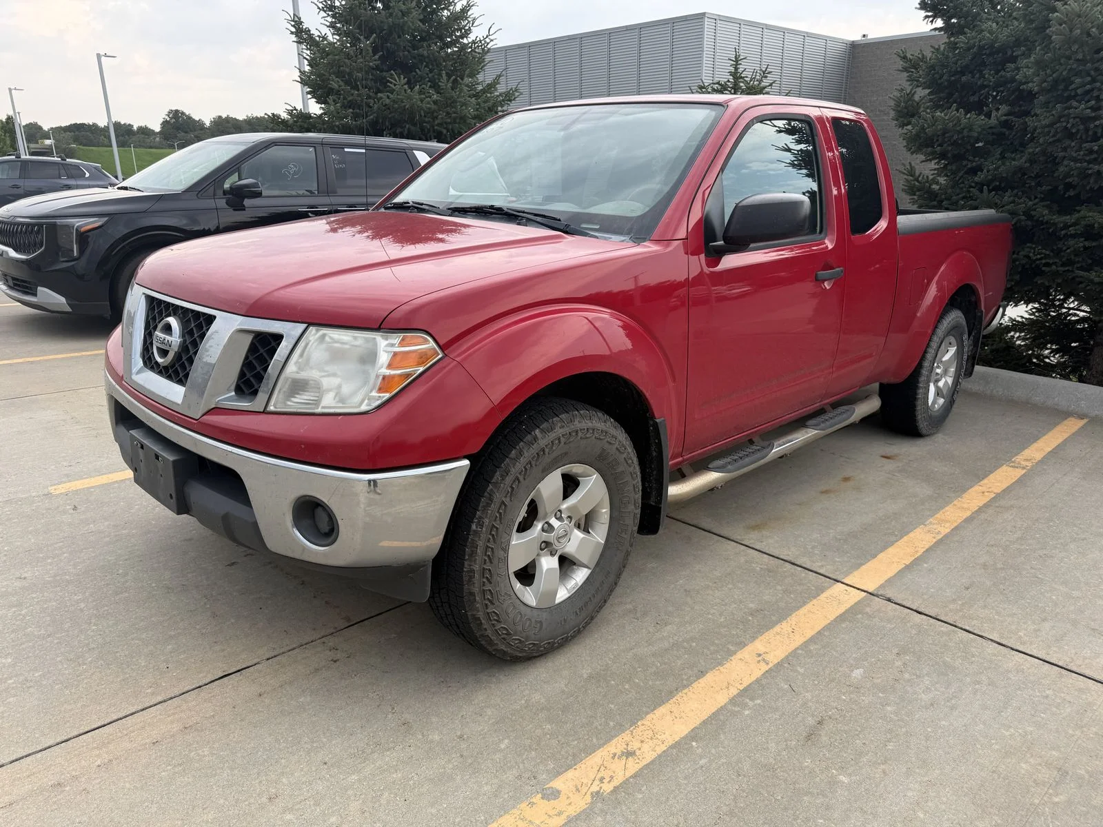 Used 2011 Red Nissan SV image 1