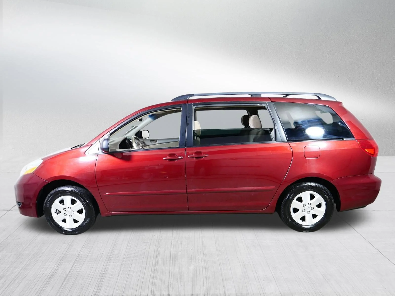 Used 2006 Salsa Red Pearl Toyota LE image 4