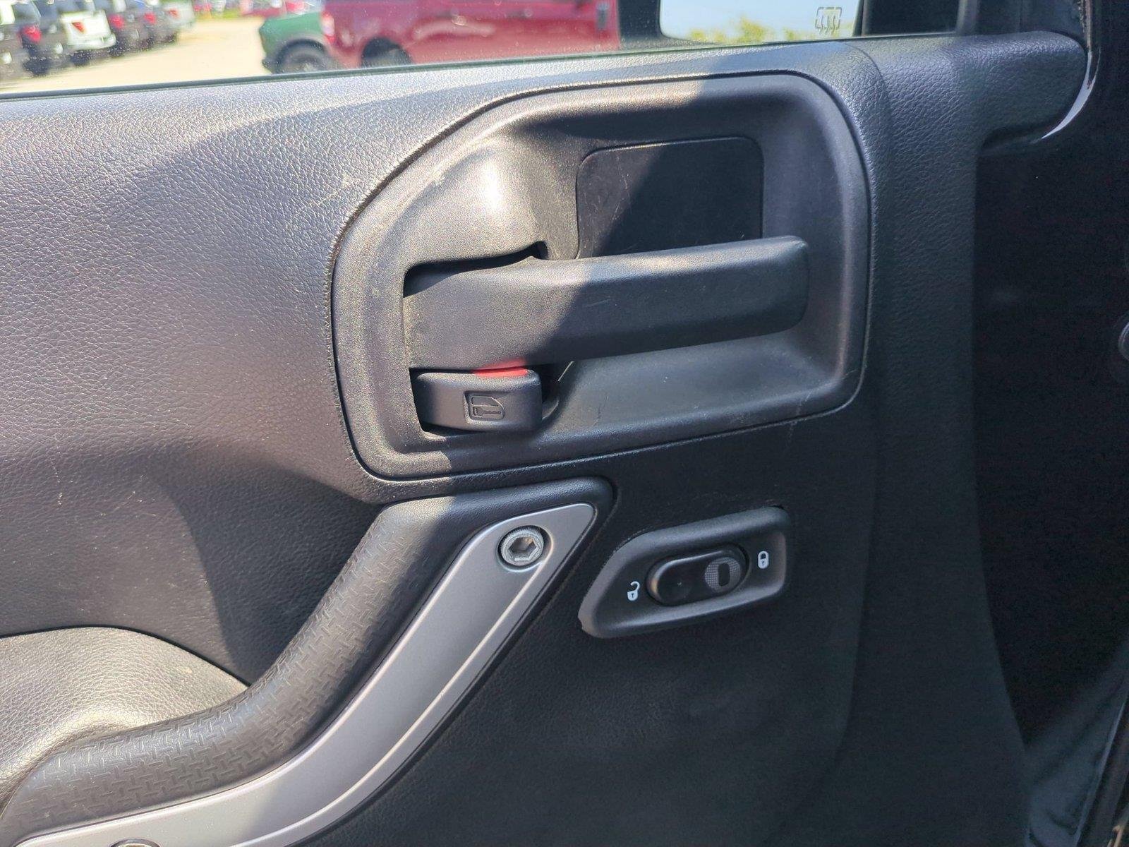 Used 2012 Black Clearcoat Jeep Sahara image 15