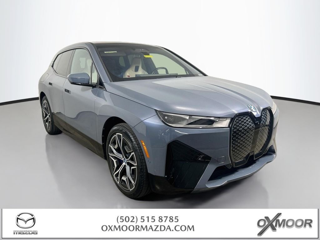 Used 2024 Storm Bay Metallic BMW xDrive50 image 1