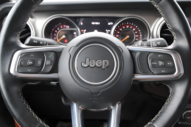 Used 2020 Orange Jeep Unlimited Sahara image 21