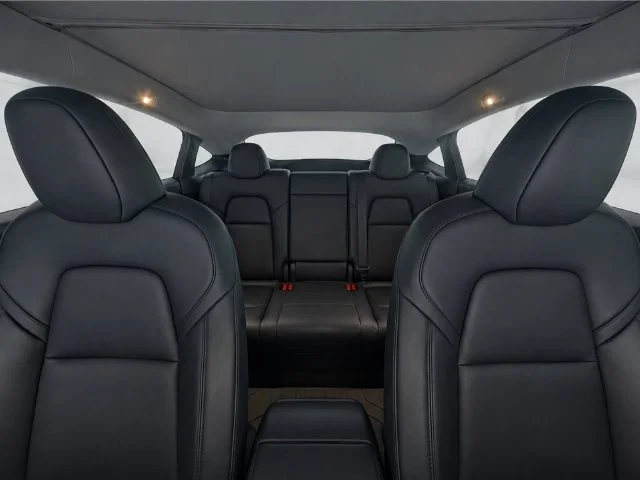 Used 2023 Solid Black Tesla Performance image 14