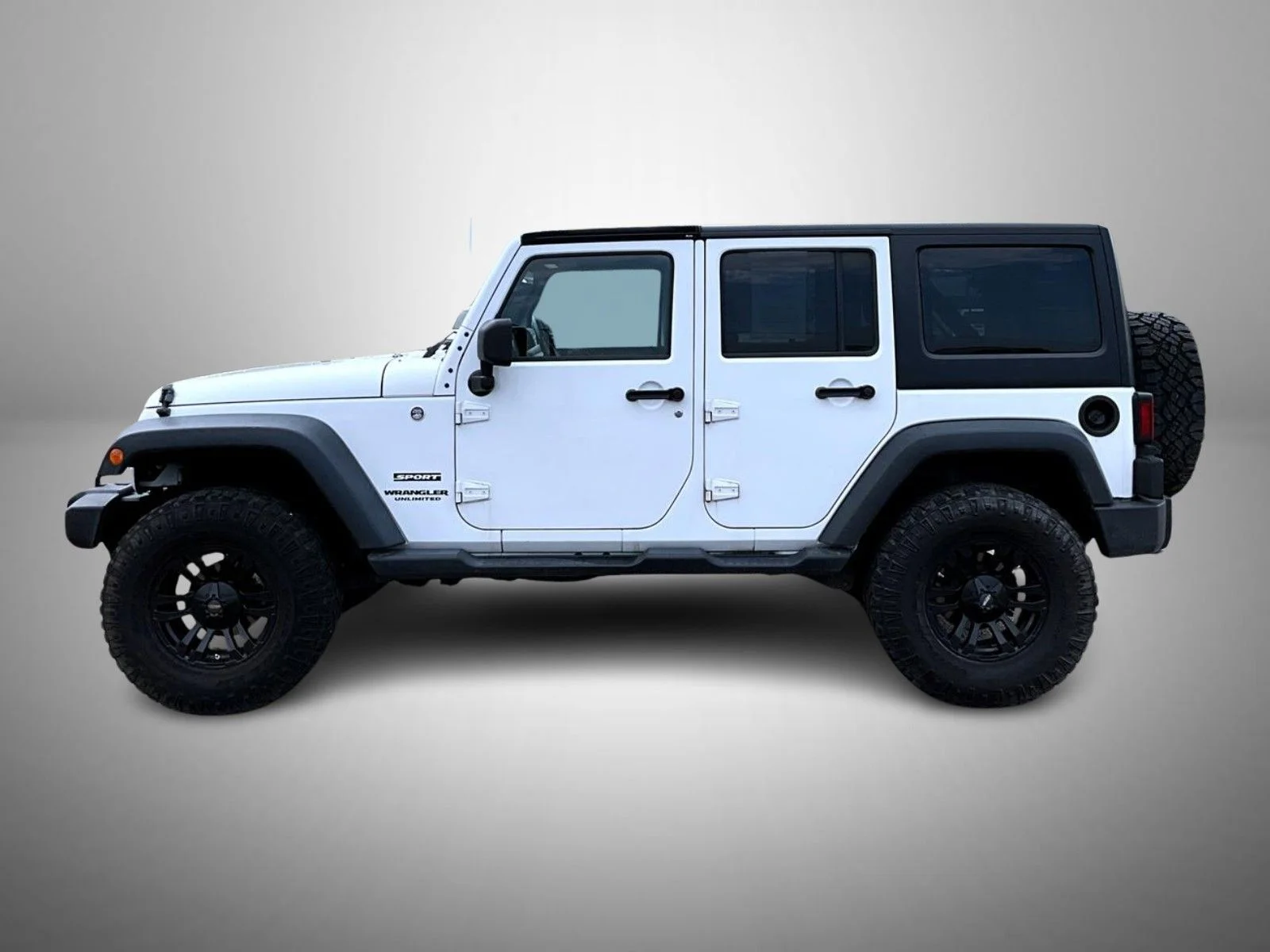 Used 2013 White Jeep Unlimited Sport image 8