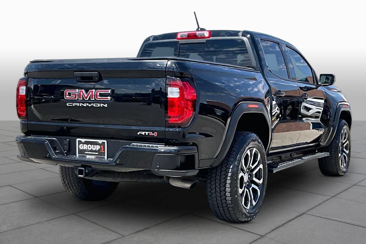Used 2023 Onyx Black GMC 4WD AT4 image 13