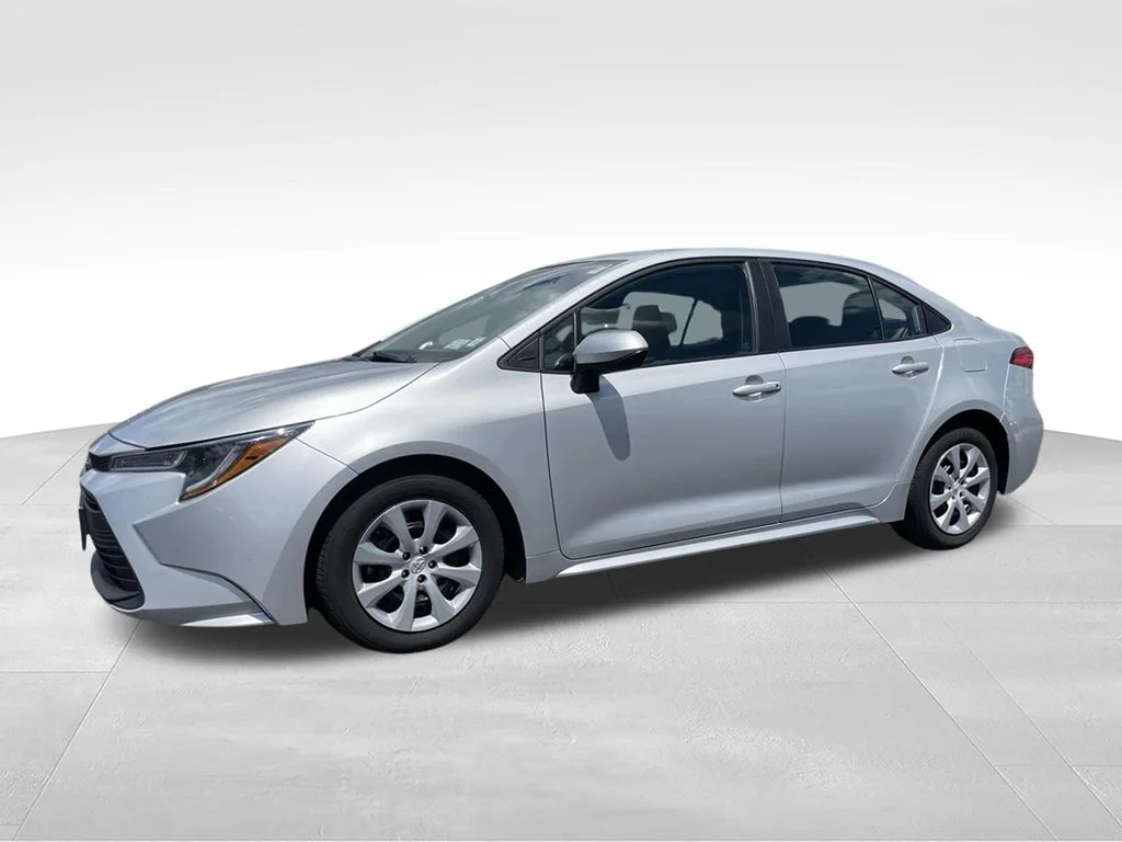 Used 2024 Classic Silver Metallic Toyota LE image 4