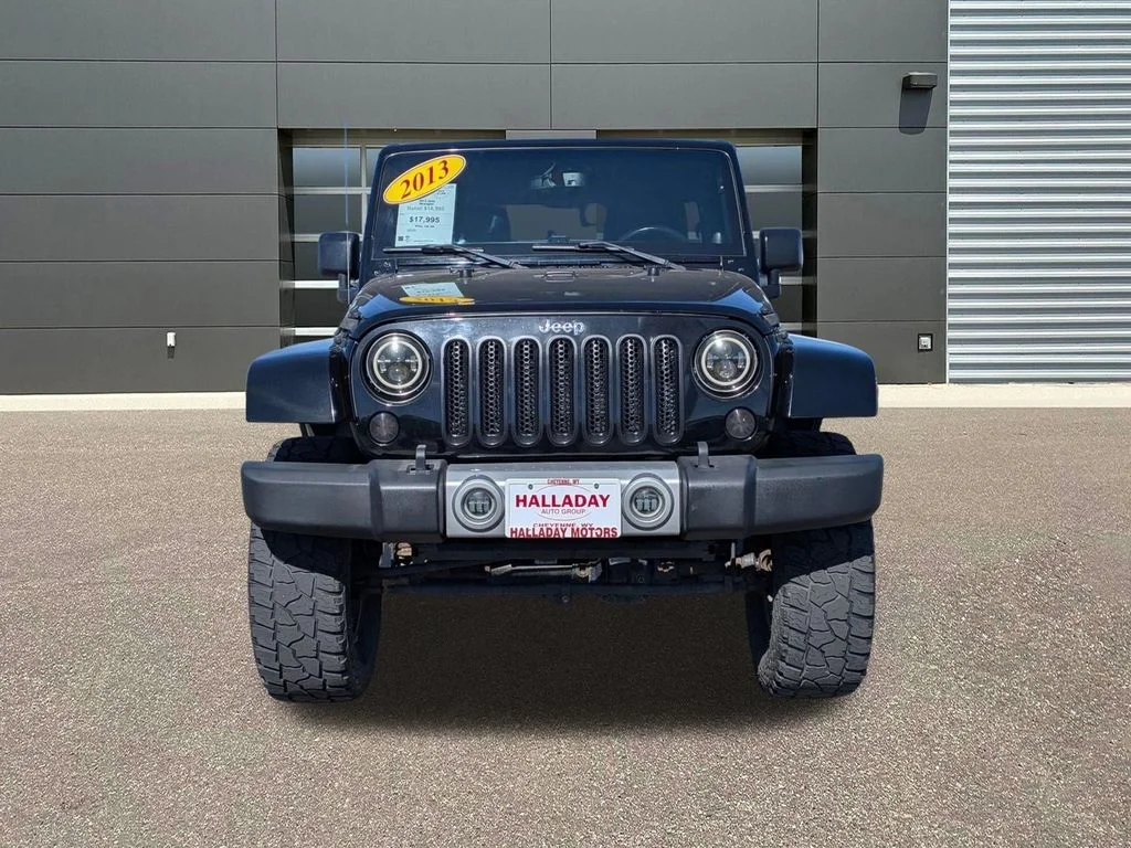 Used 2013 Jeep Wrangler Unlimited Sahara with VIN 1C4BJWEG0DL586007 for sale in Cheyenne, WY