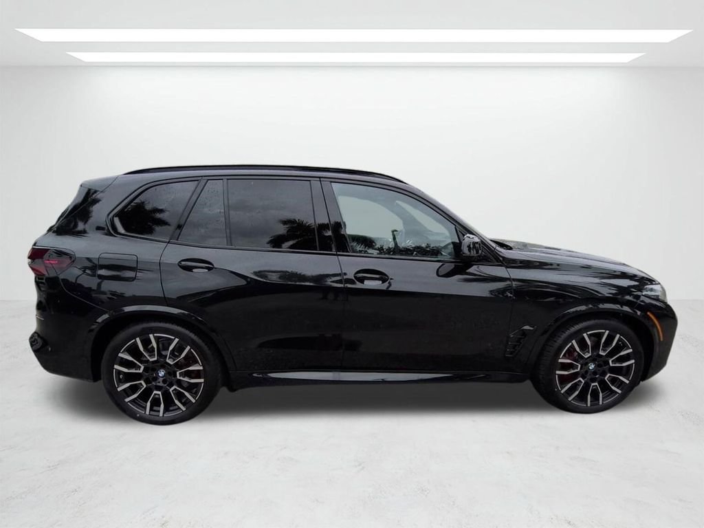 New 2026 Black Sapphire Metallic BMW xDrive50e image 3