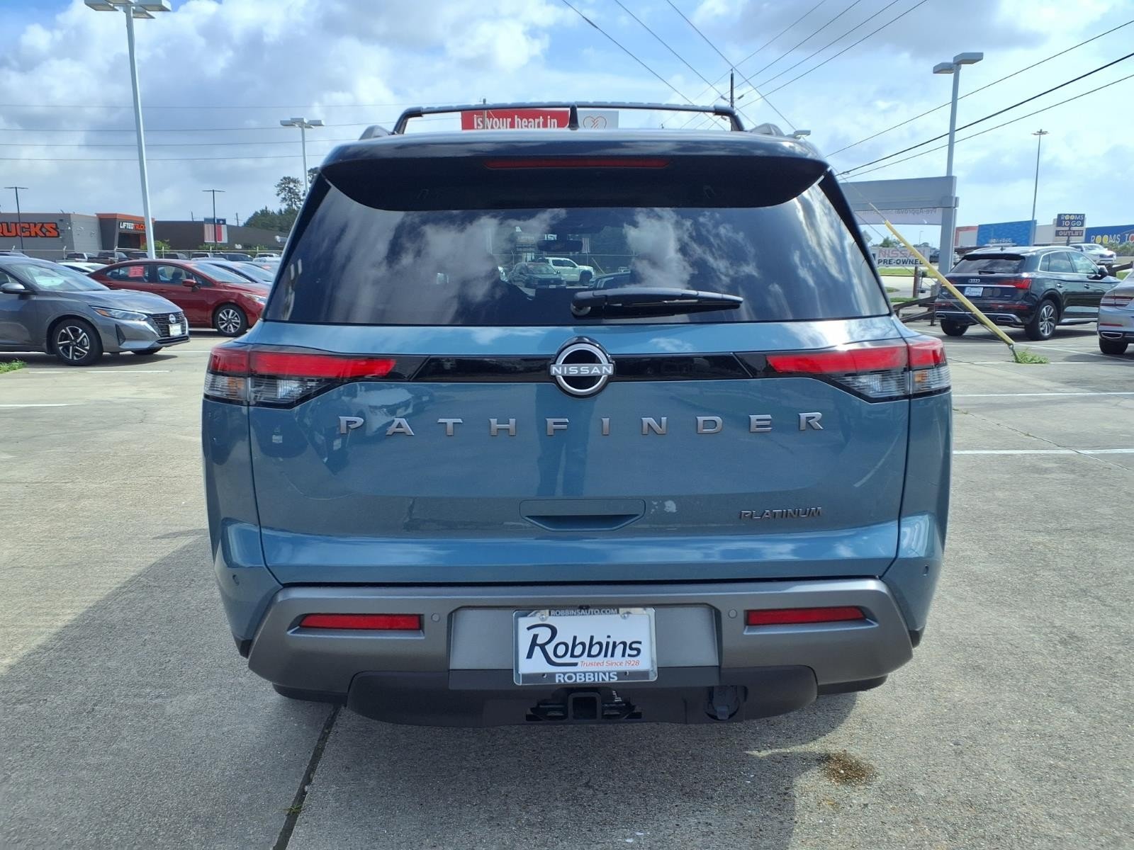 2026 Nissan Pathfinder Platinum Green at Robbins Nissan