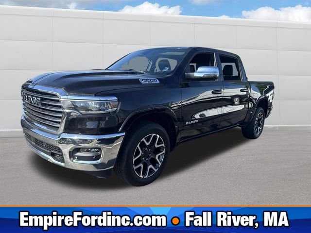 Used 2025 Diamond Black Ram Laramie image 1