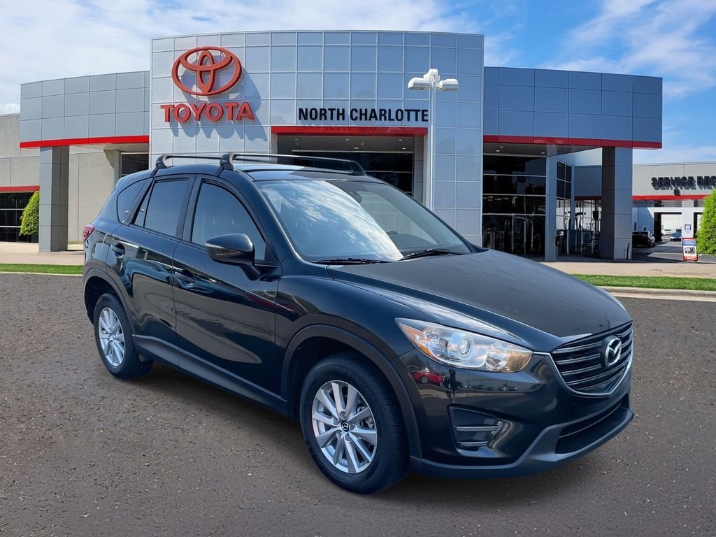 Used 2016 Mazda CX-5 Sport with VIN JM3KE2BYXG0831760 for sale in Huntersville, NC