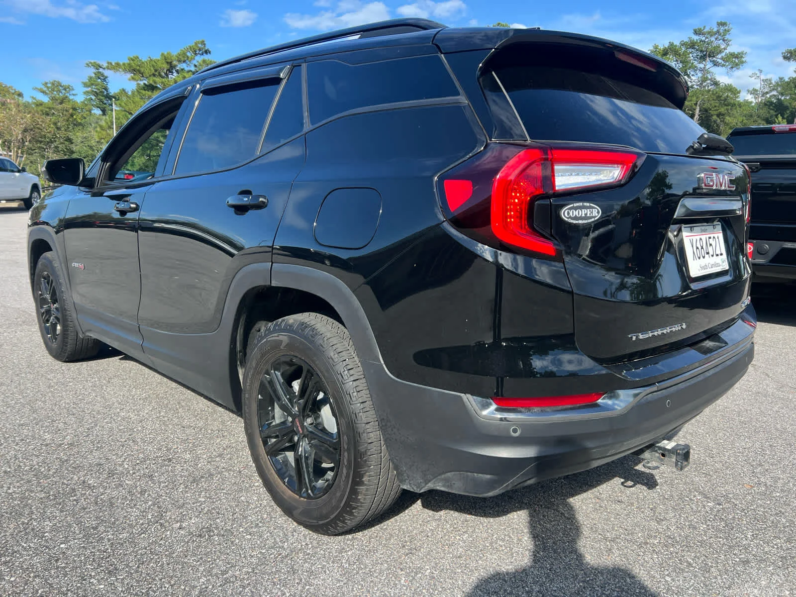 Used 2024 Ebony Twilight Metallic GMC AT4 image 4
